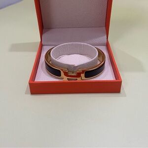 Hermes Elegant Black and Gold Men's Bracelet